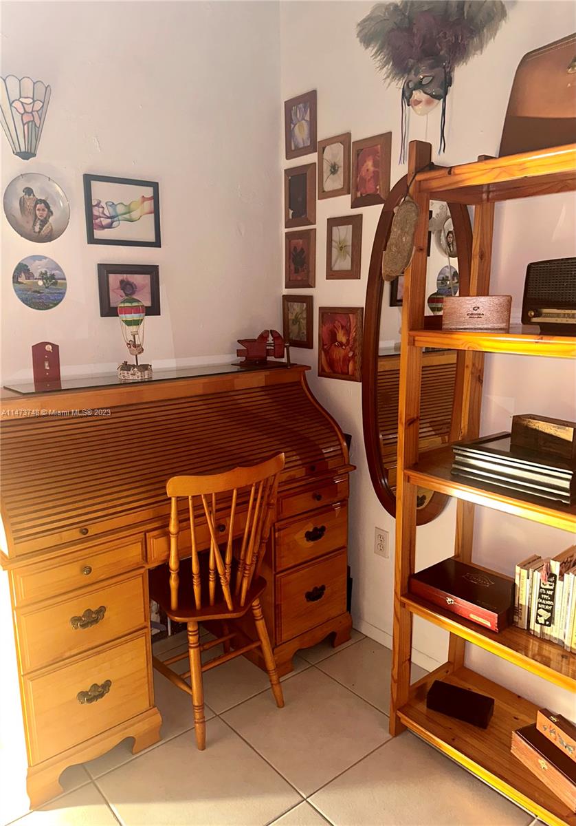 Olympia Heights Miami, FL 33165 - Photo 21 of 45 a view of walk in closet with clothes and shoes