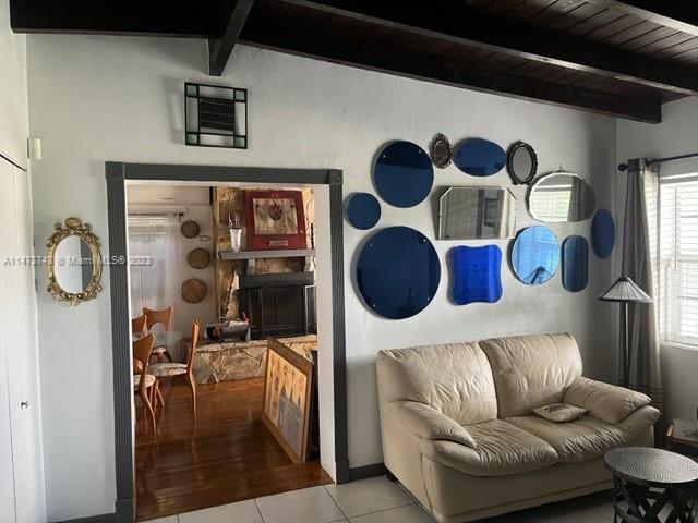 Olympia Heights Miami, FL 33165 - Photo 3 of 45 a living room with furniture and a mirror