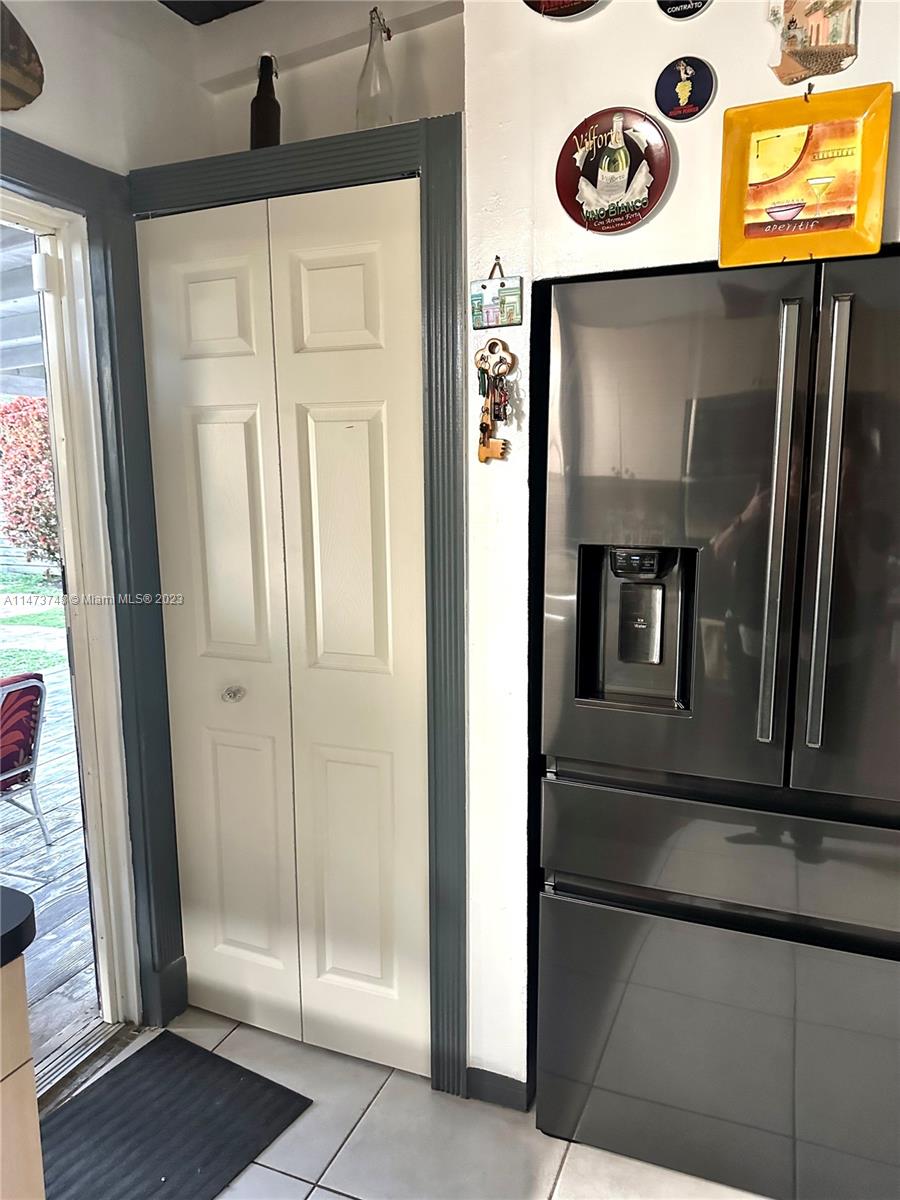 Olympia Heights Miami, FL 33165 - Photo 31 of 45 a hallway with storage and utility