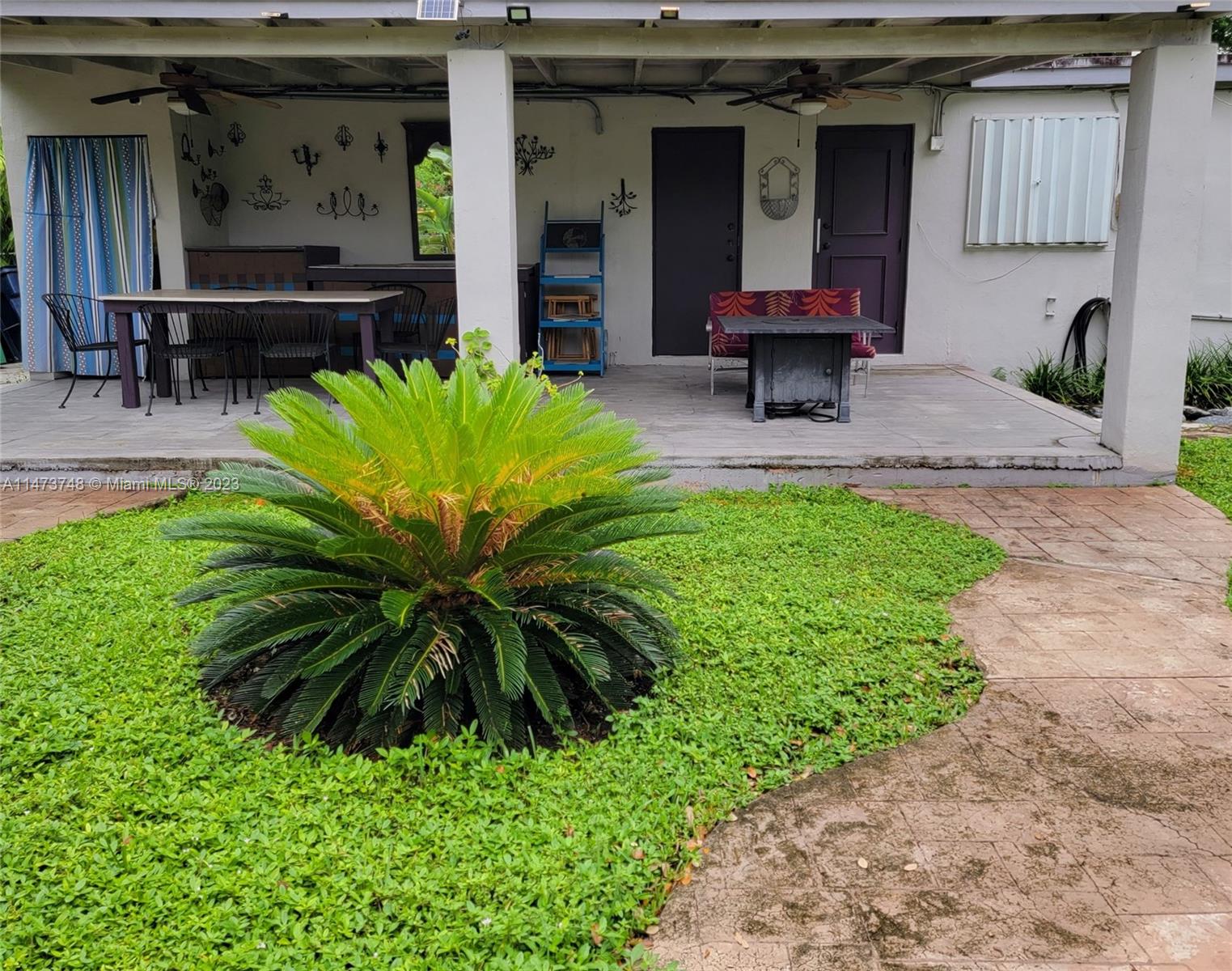 Olympia Heights Miami, FL 33165 - Photo 36 of 45 a view of two chairs in a patio
