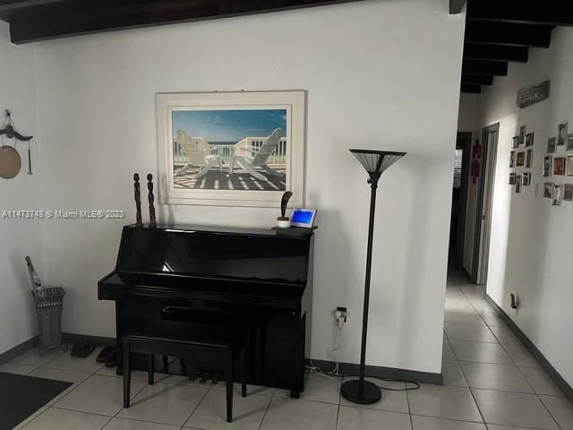 Olympia Heights Miami, FL 33165 - Photo 4 of 45 a living room with furniture and a piano