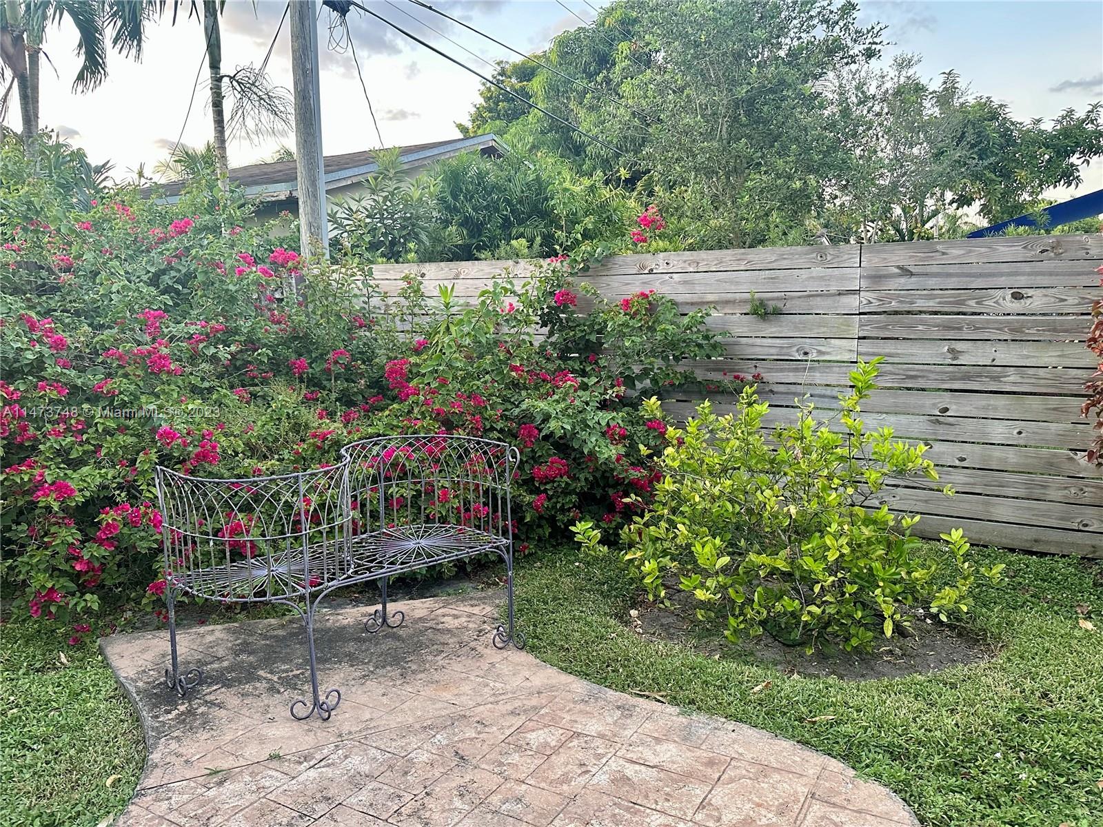 Olympia Heights Miami, FL 33165 - Photo 45 of 45 a view of a pathway of a house with a yard