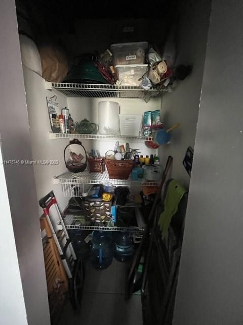 Olympia Heights Miami, FL 33165 - Photo 8 of 45 a kitchen with a stove and cabinets