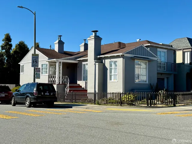 a front view of a house with a porch