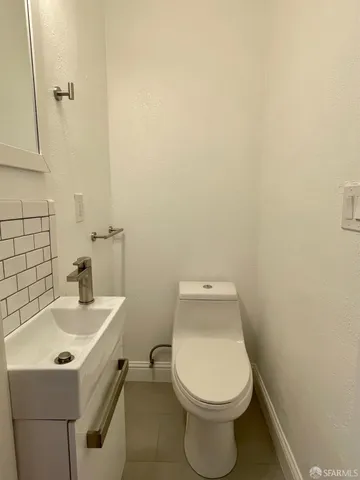 a bathroom with a sink and a toilet