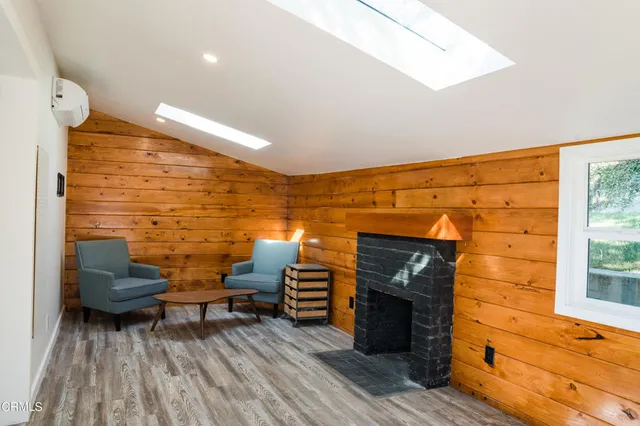 a backyard of a house with seating space