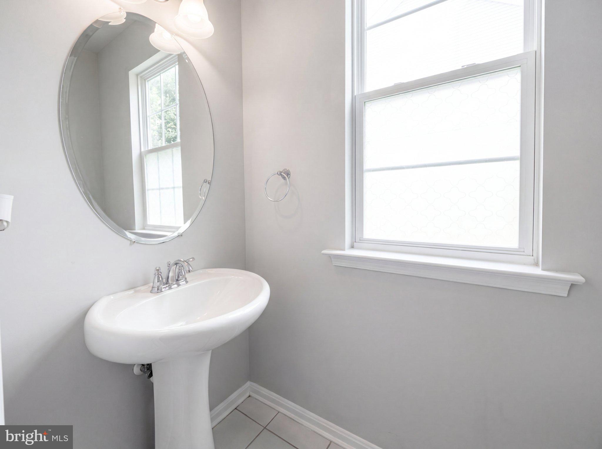 7923 Fawn Run Jessup, MD 20794 - Photo 18 of 22 Bright and airy bathroom oasis.