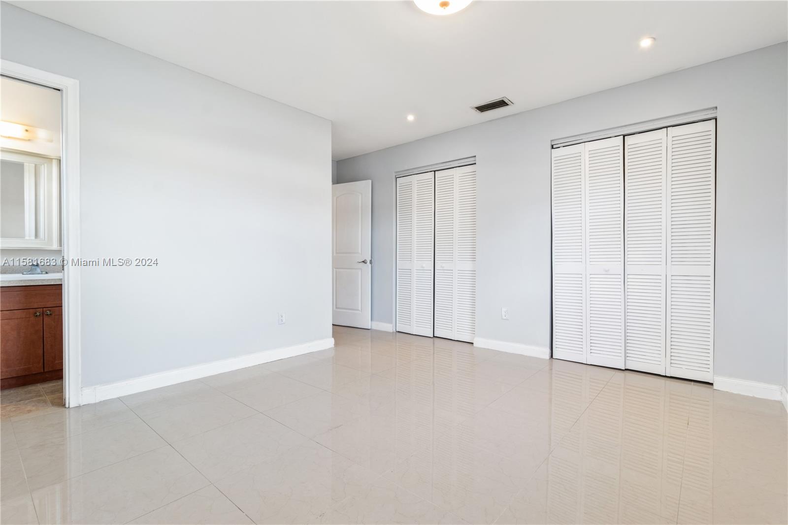10680 Ember Street Boca Raton, FL 33428 - Photo 12 of 19 an empty room with window