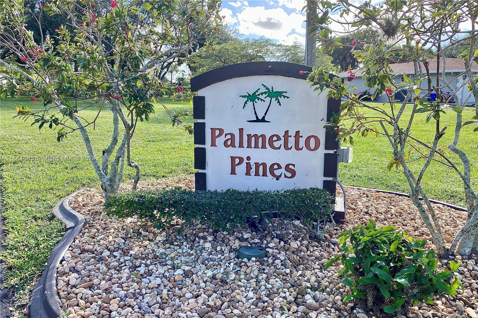 10680 Ember Street Boca Raton, FL 33428 - Photo 19 of 19 a sign on the side of the road