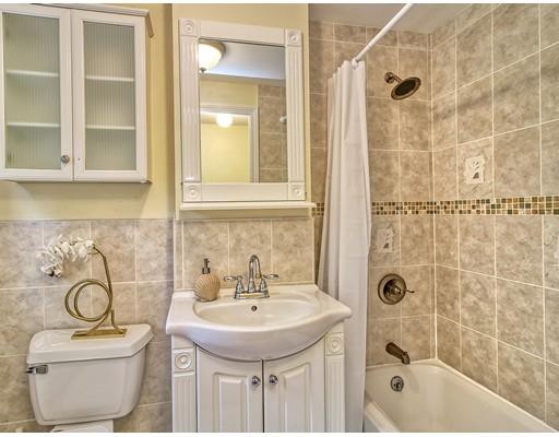 20 Grapevine Avenue Lexington, MA 02421 - Photo 9 of 25 a bathroom with a sink a toilet and shower