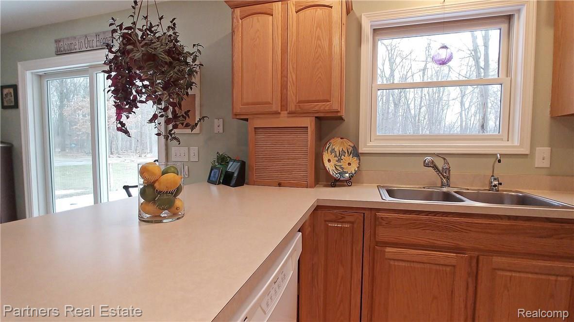 5371 Dutton Road Gregory, MI 48137 - Photo 16 of 72 View of kitchen window looking out at the back yard!