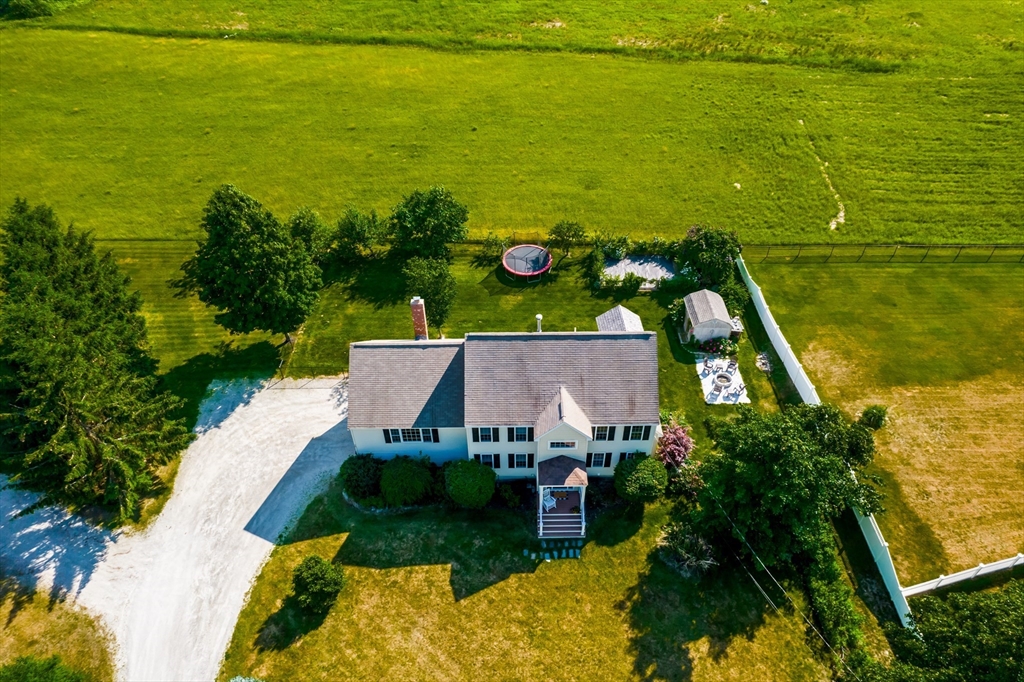 46 Brookline Street Pepperell, MA 01463 - Photo 3 of 41 a aerial view of a house with a ocean view