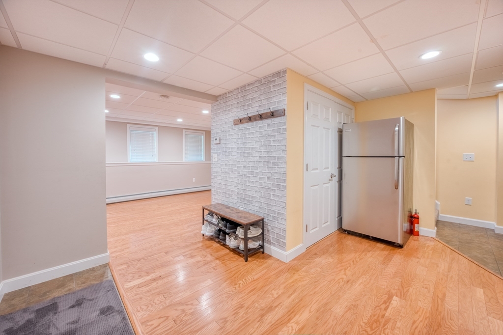 46 Brookline Street Pepperell, MA 01463 - Photo 37 of 41 a view of a livingroom with a staircase