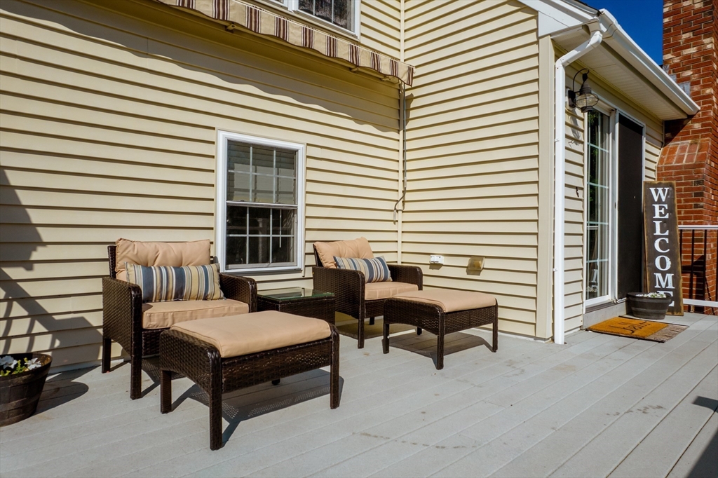 46 Brookline Street Pepperell, MA 01463 - Photo 38 of 41 a balcony with furniture and a window