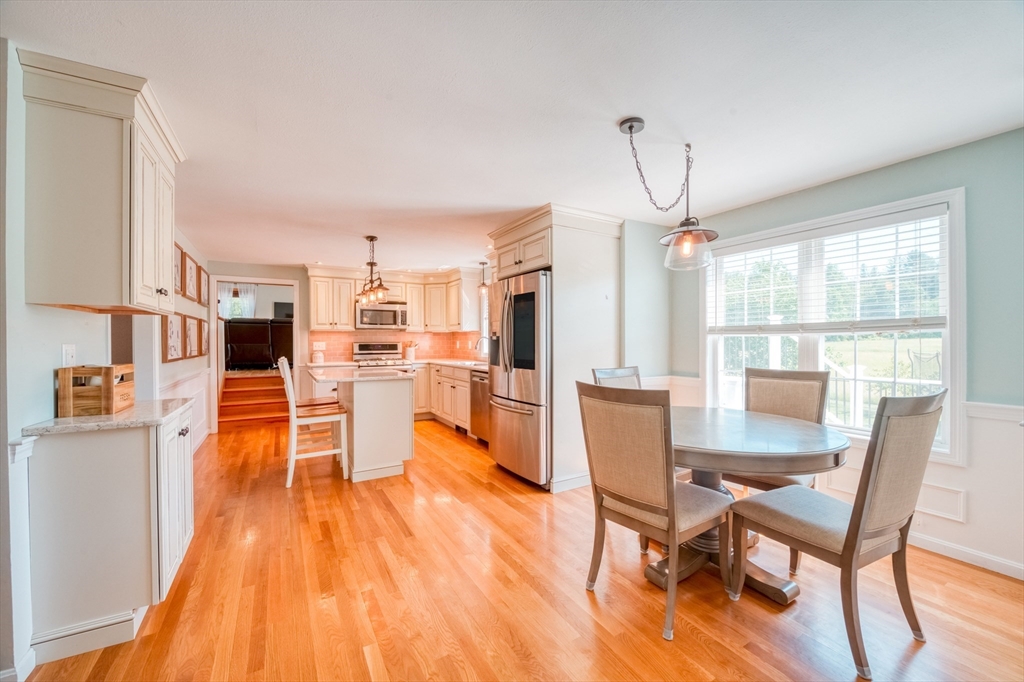 46 Brookline Street Pepperell, MA 01463 - Photo 5 of 41 a dining room with furniture and wooden floor