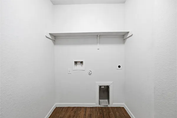 a view of small space with racks on the wall