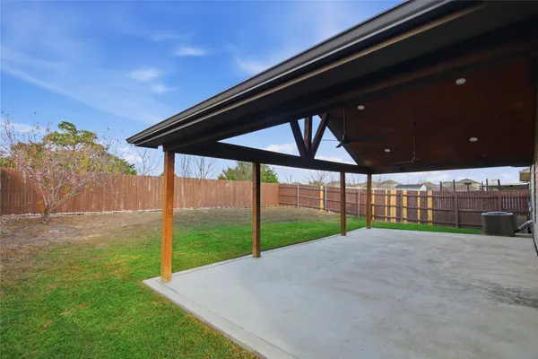 a view of a backyard with a garden