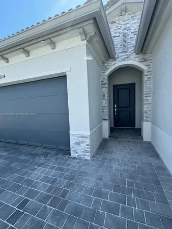 a view of a hallway with a door