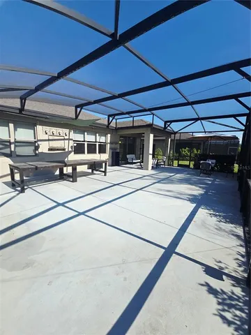 a view of a garage with cars