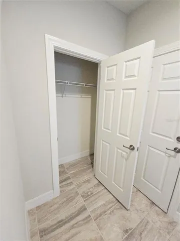 an empty room with a door