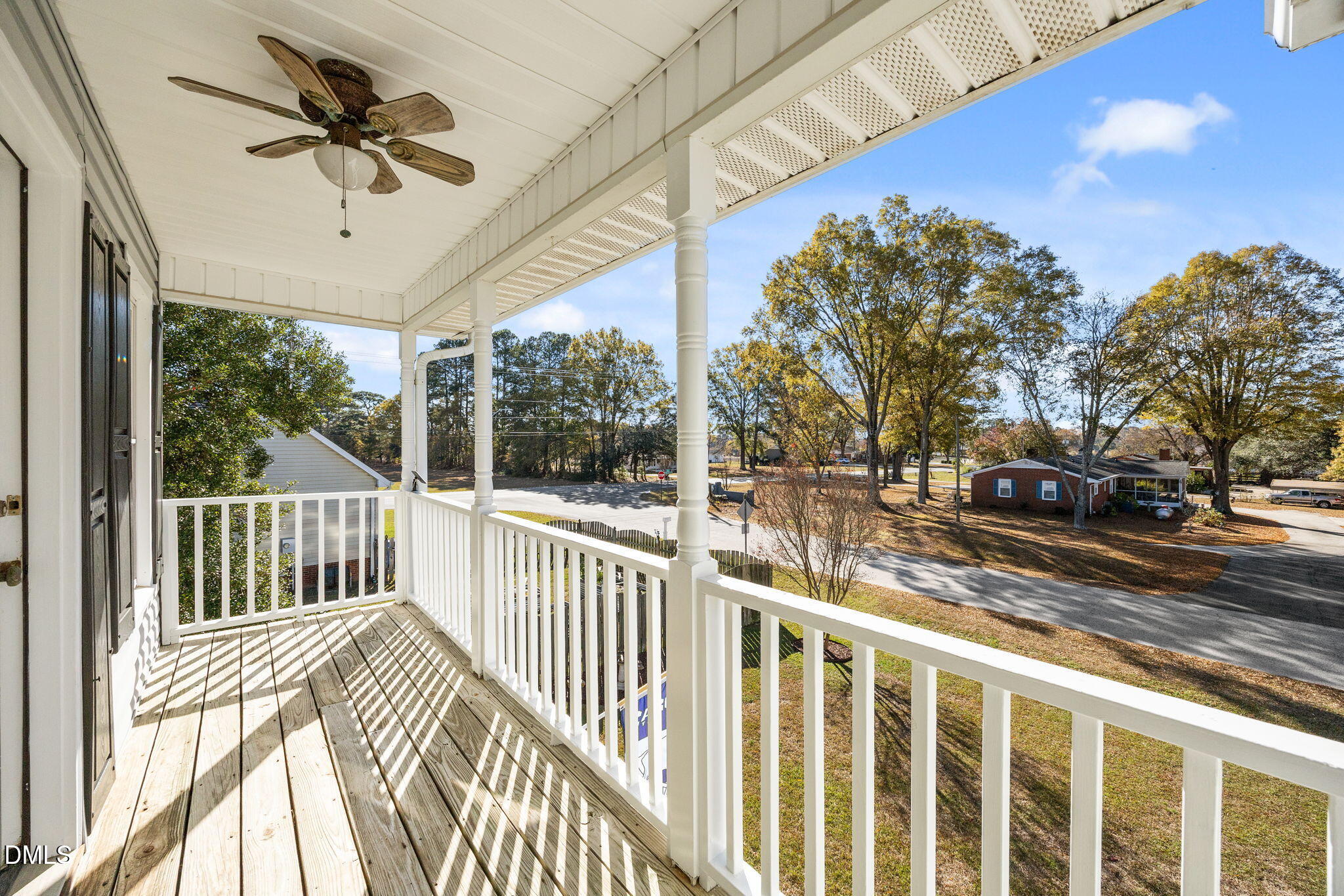 30 Stockton Drive Angier, NC 27501 - Photo 11 of 52 a view of a porch with a floor to ceiling window