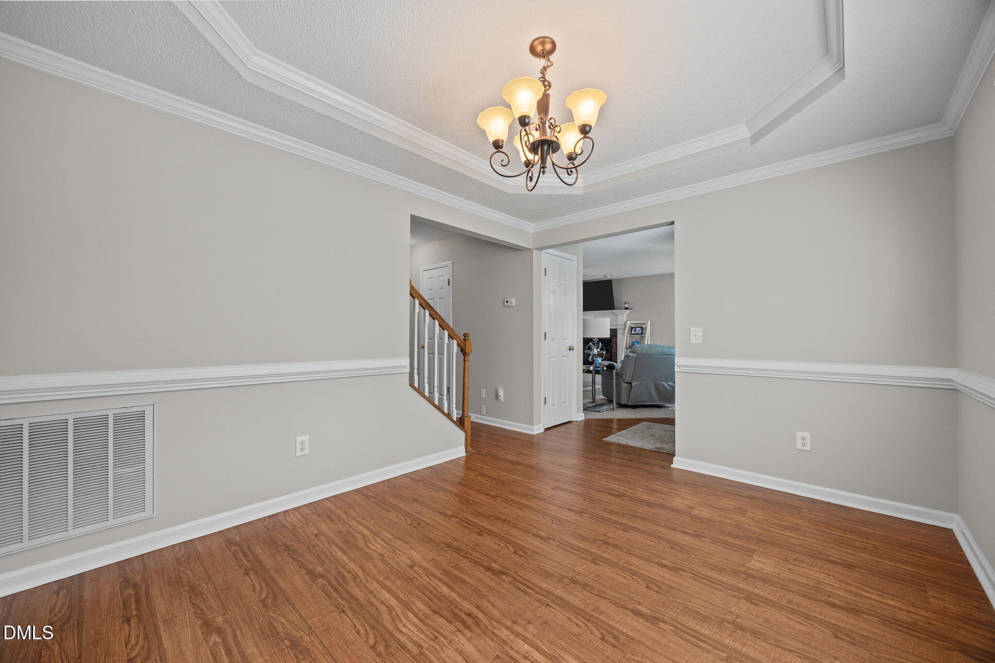 30 Stockton Drive Angier, NC 27501 - Photo 17 of 52 a view of an empty room with wooden floor