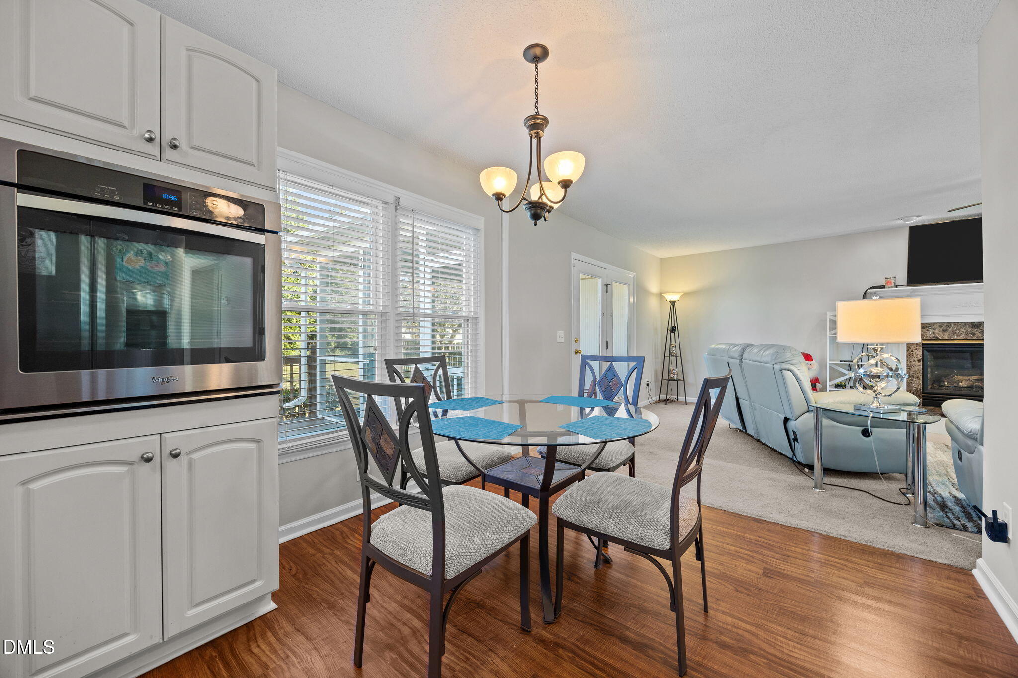 30 Stockton Drive Angier, NC 27501 - Photo 20 of 52 a view of a dining room with furniture window and wooden floor