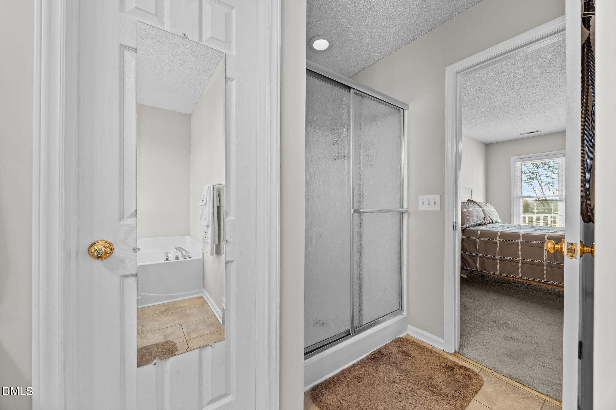 30 Stockton Drive Angier, NC 27501 - Photo 39 of 52 a view of a bathroom with tub shower