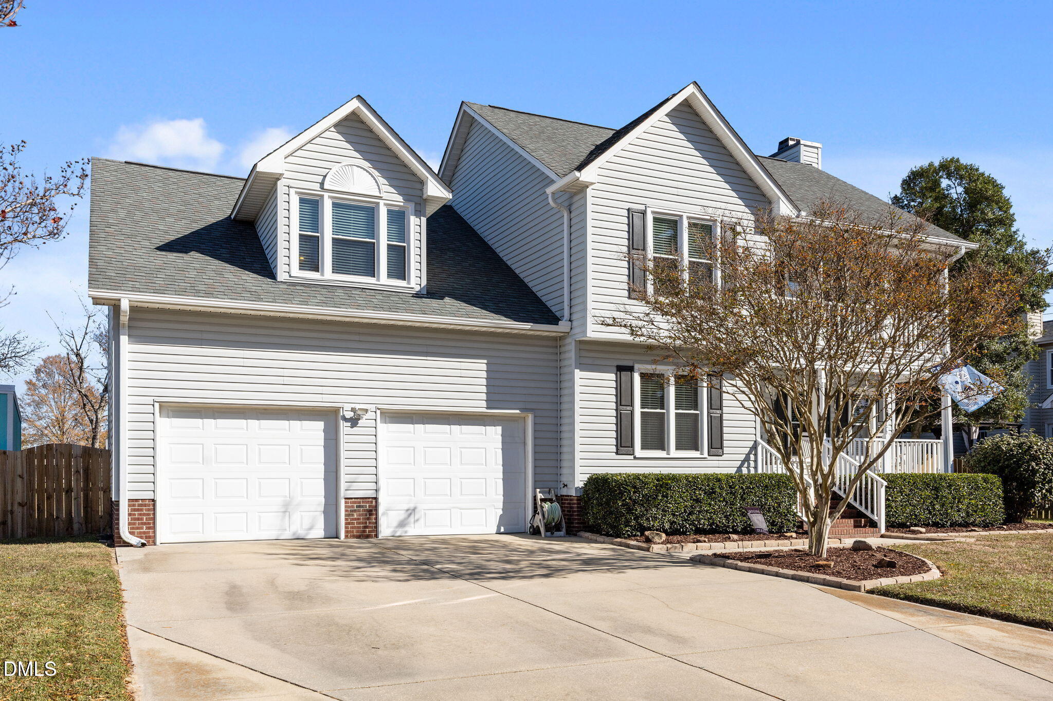 30 Stockton Drive Angier, NC 27501 - Photo 50 of 52 a front view of a house with a yard