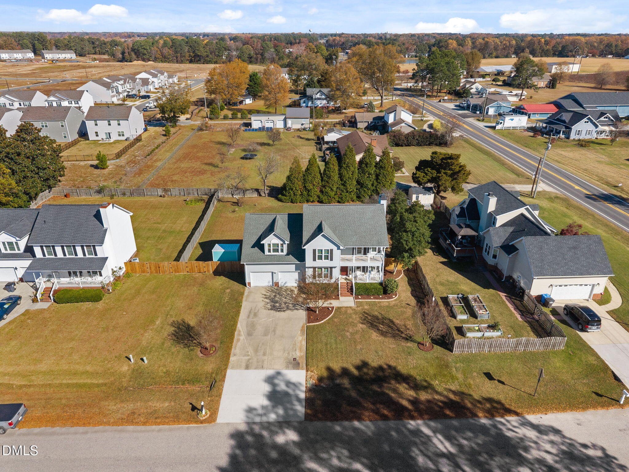 30 Stockton Drive Angier, NC 27501 - Photo 6 of 52 an aerial view of residential houses with outdoor space