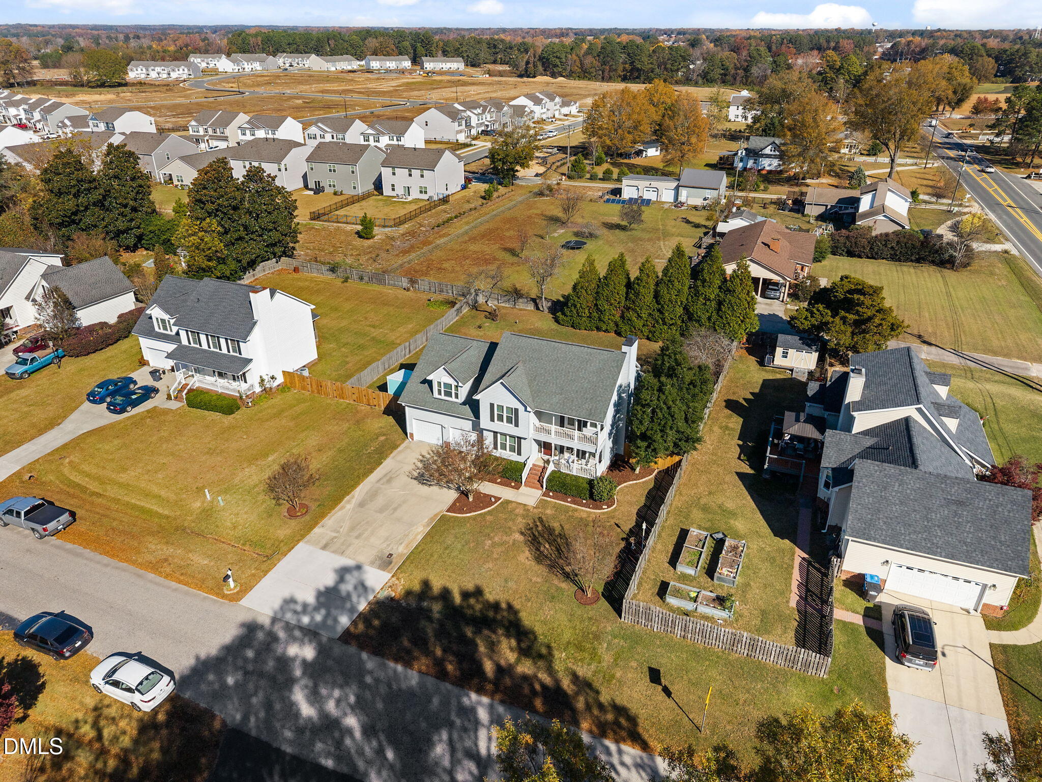 30 Stockton Drive Angier, NC 27501 - Photo 7 of 52 an aerial view of residential houses with outdoor space
