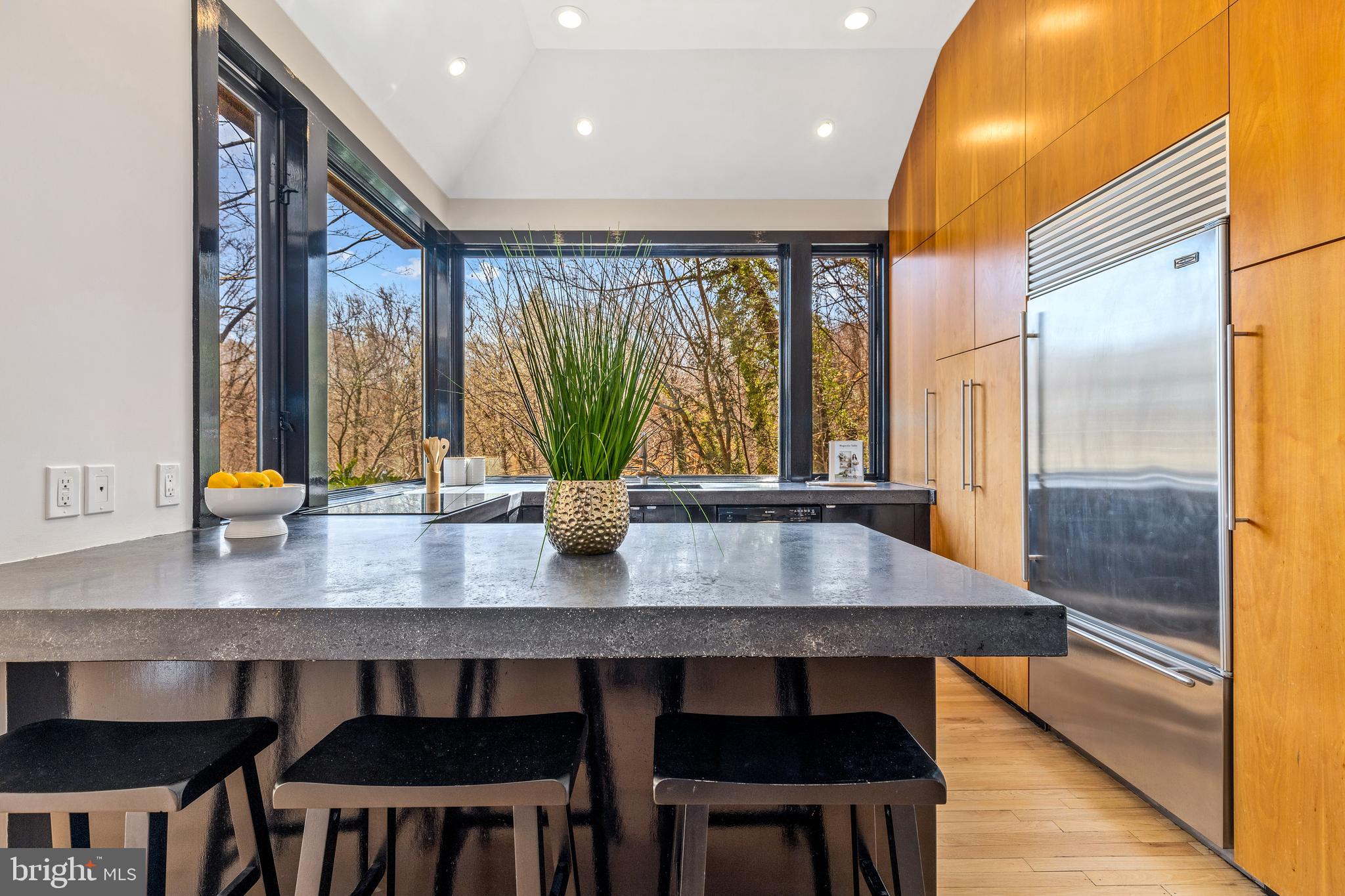 2609 Klingle Road Northwest Washington, DC 20008 - Photo 12 of 41 a view of a dining room with furniture window and wooden floor