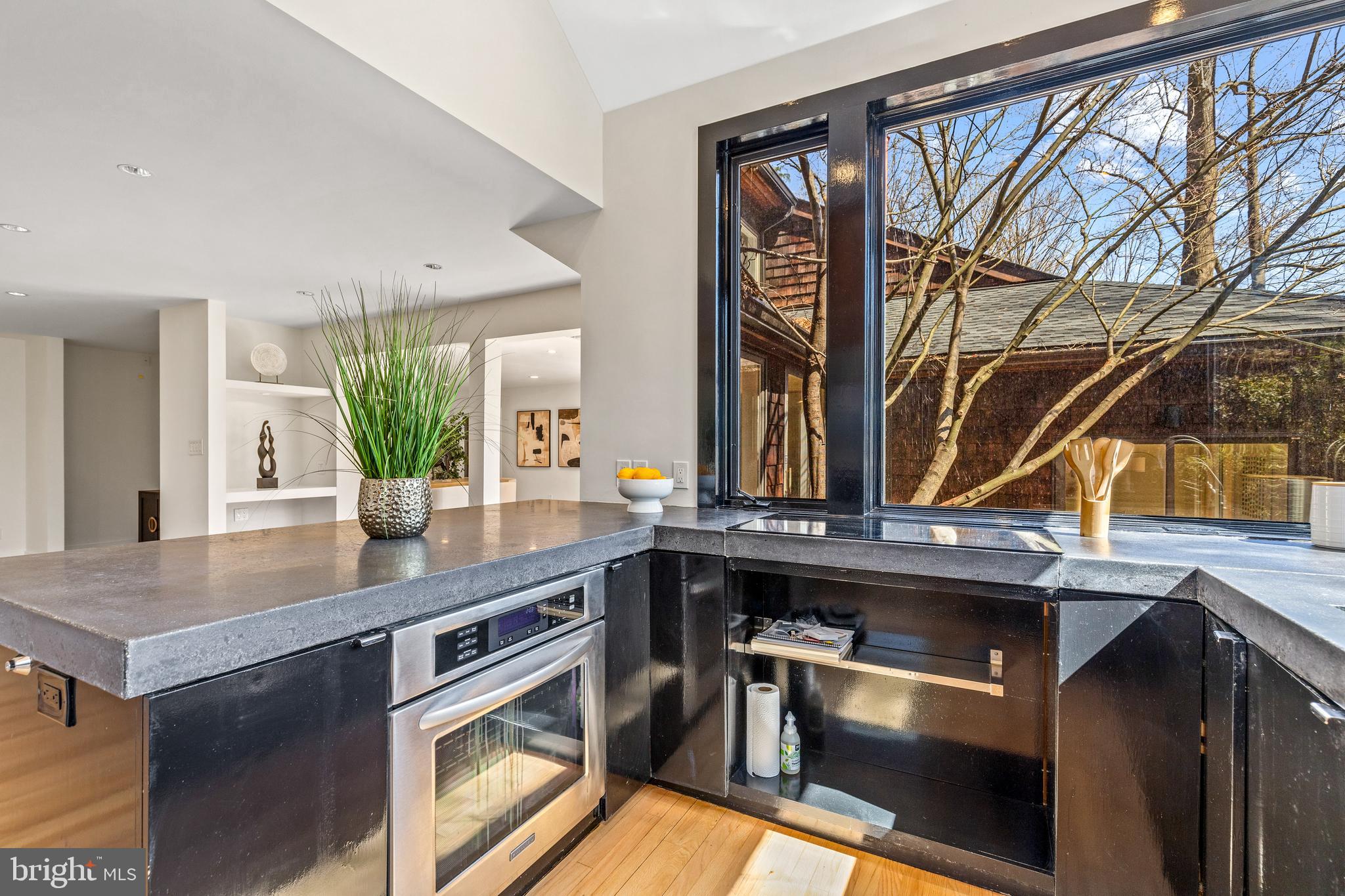 2609 Klingle Road Northwest Washington, DC 20008 - Photo 13 of 41 a kitchen with a sink and a stove
