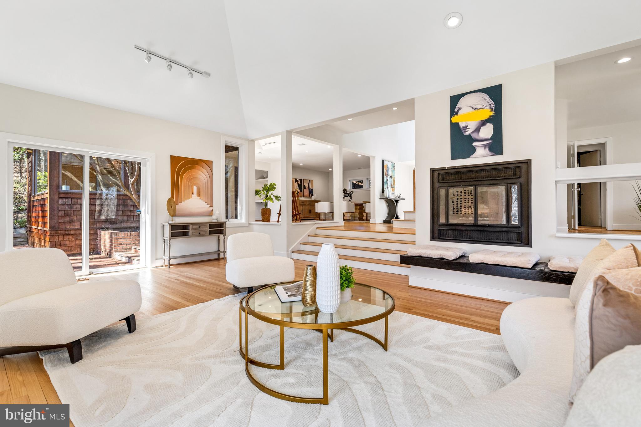 2609 Klingle Road Northwest Washington, DC 20008 - Photo 16 of 41 a living room with furniture and a flat screen tv