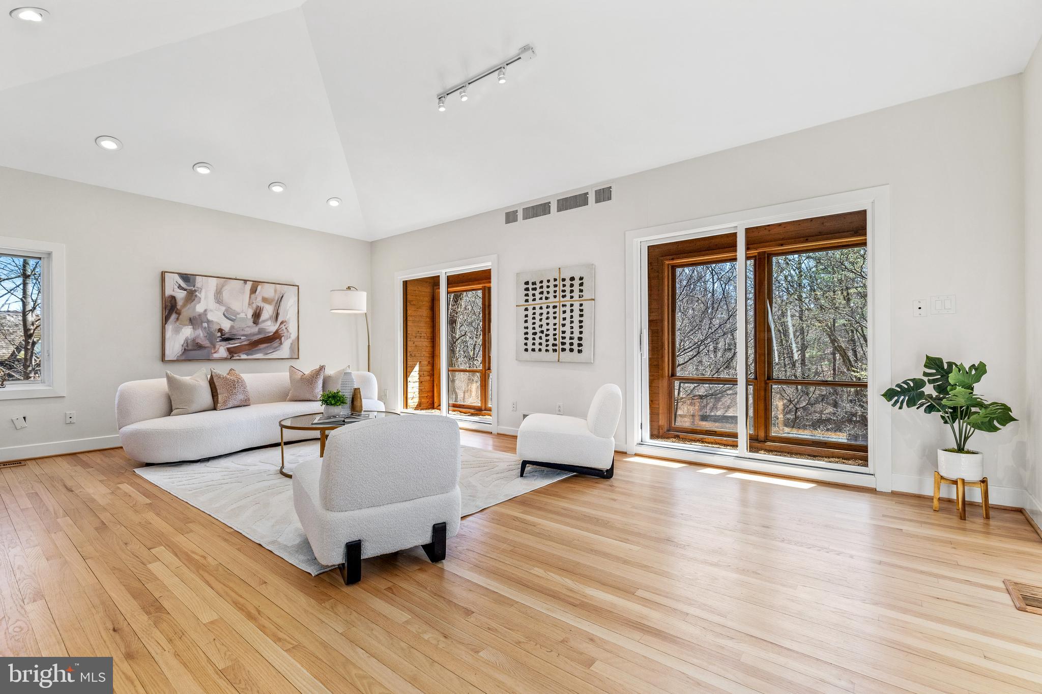 2609 Klingle Road Northwest Washington, DC 20008 - Photo 17 of 41 a living room with furniture and a large window
