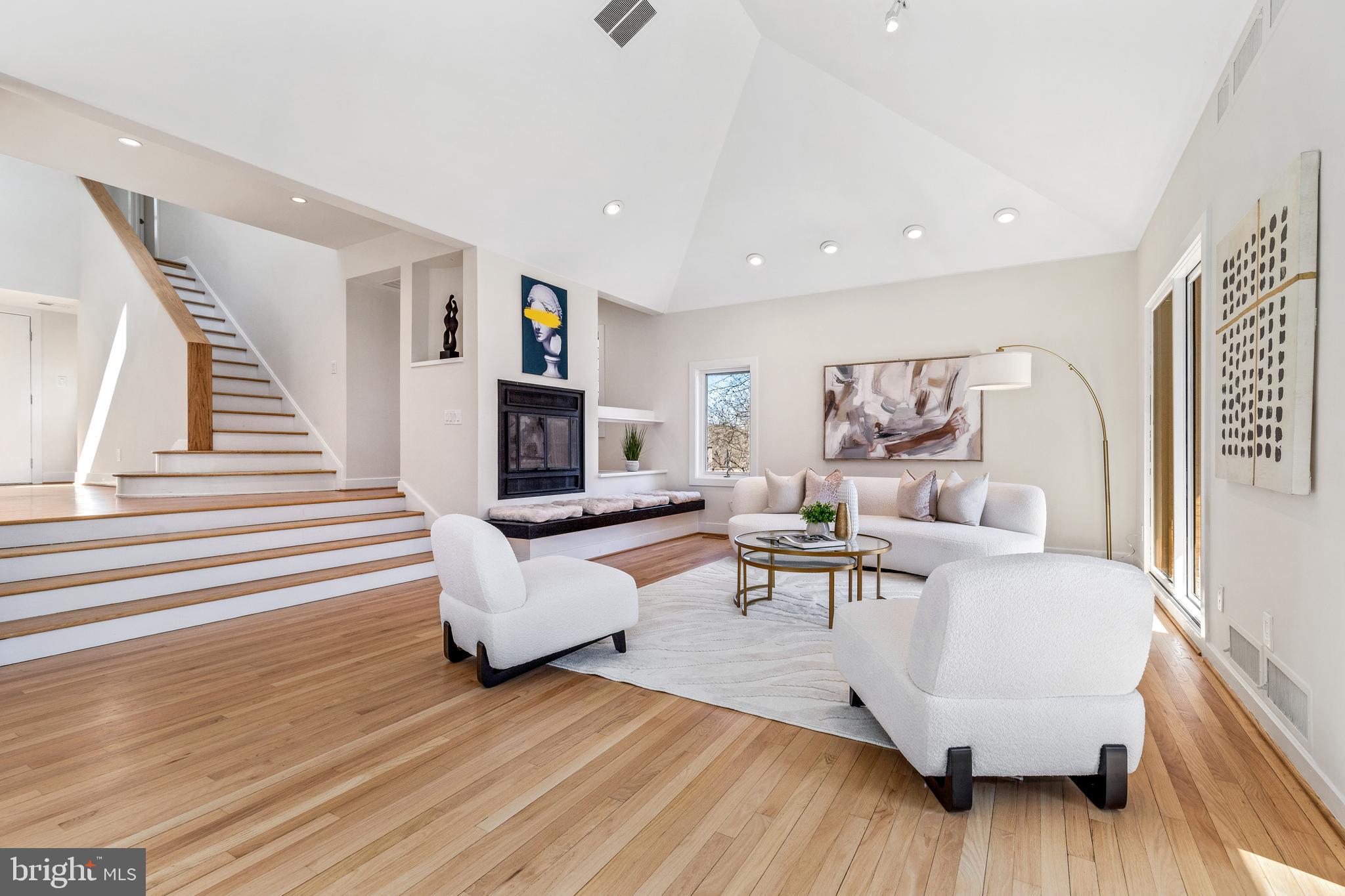 2609 Klingle Road Northwest Washington, DC 20008 - Photo 18 of 41 a living room with furniture and a wooden floor