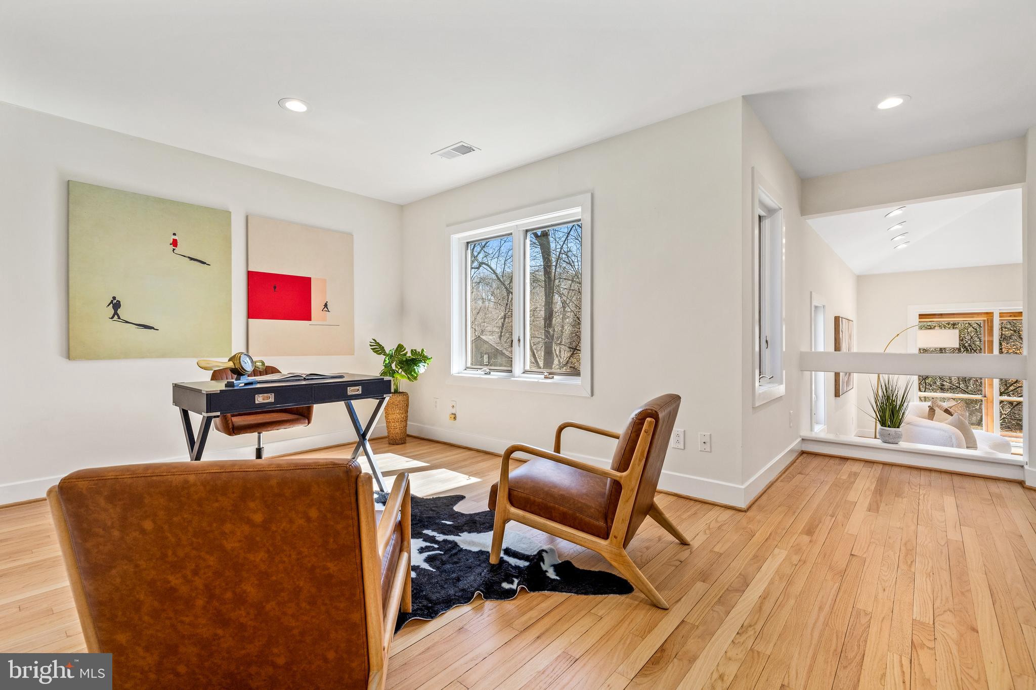 2609 Klingle Road Northwest Washington, DC 20008 - Photo 19 of 41 a living room with furniture and a wooden floor