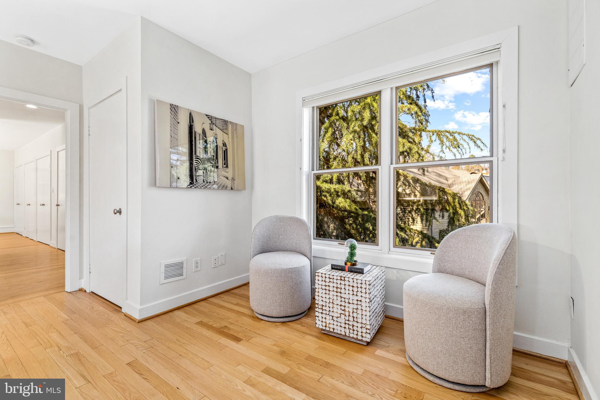 2609 Klingle Road Northwest Washington, DC 20008 - Photo 23 of 41 a living room with furniture and a large window