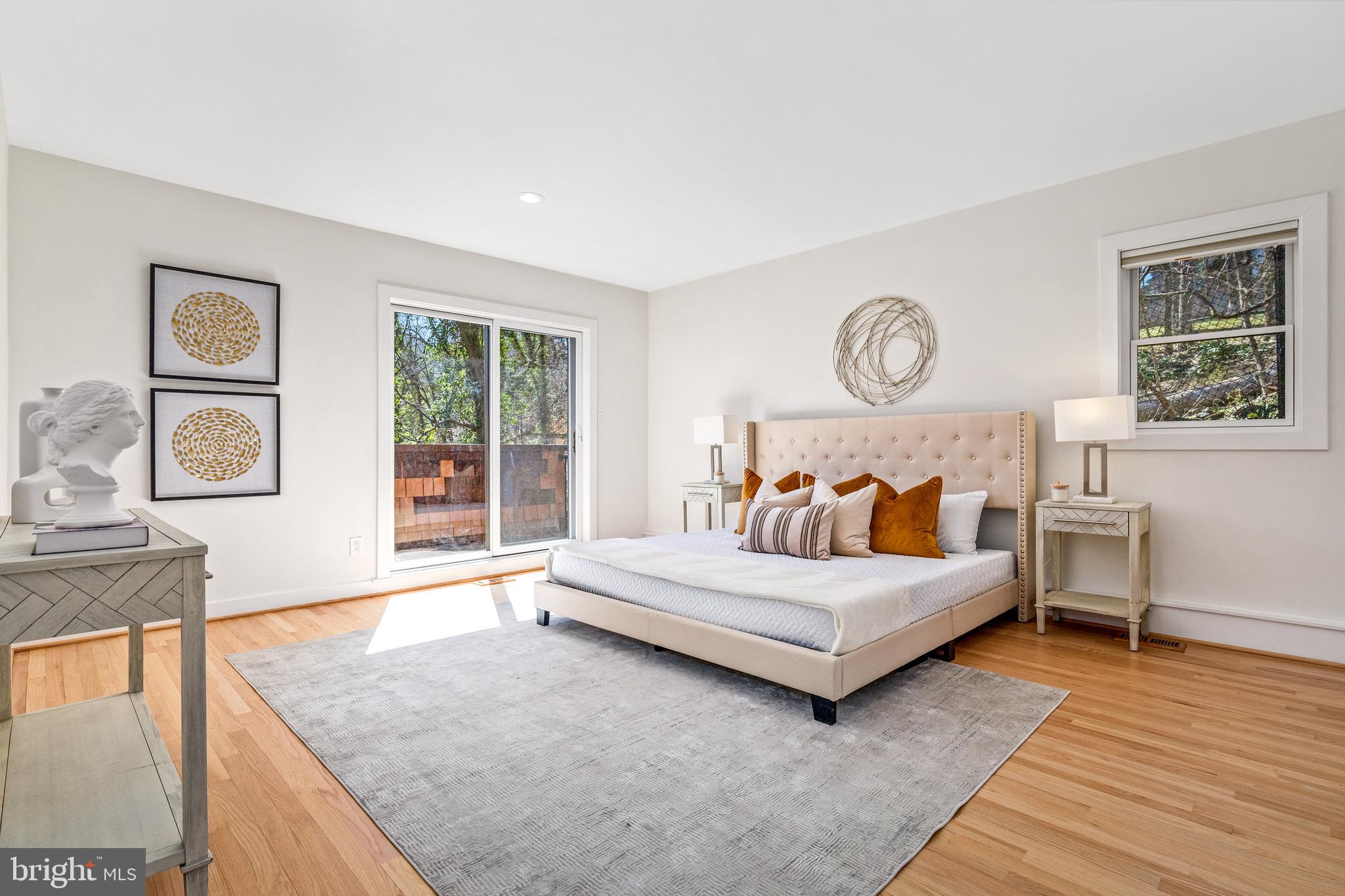 2609 Klingle Road Northwest Washington, DC 20008 - Photo 24 of 41 a large bedroom with a bed and window