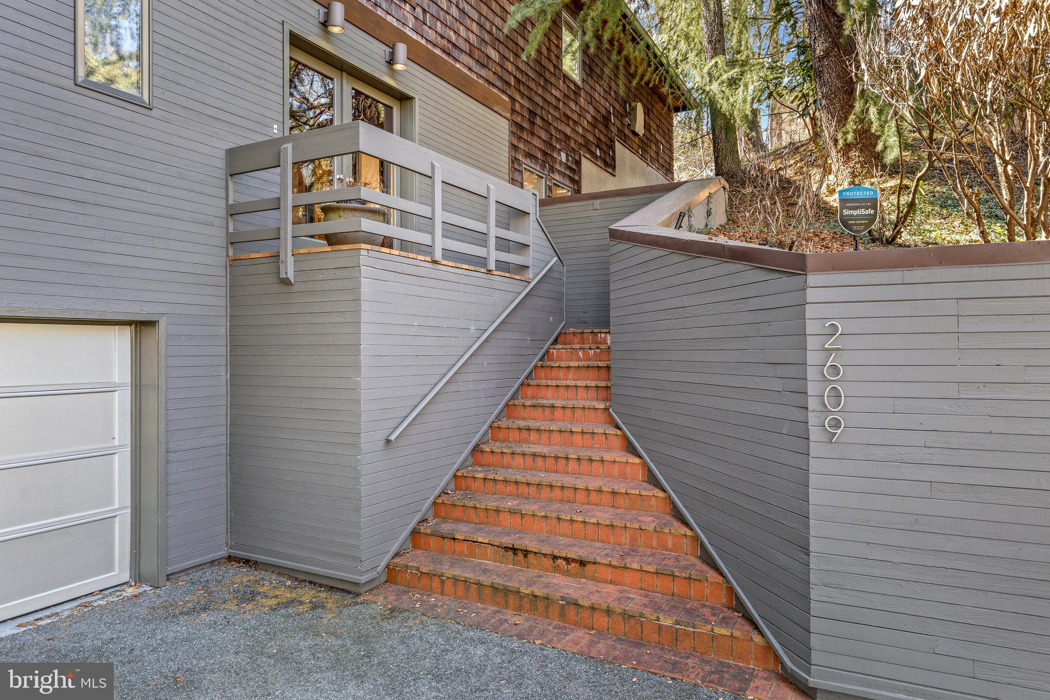 2609 Klingle Road Northwest Washington, DC 20008 - Photo 3 of 41 a view of a house with a yard