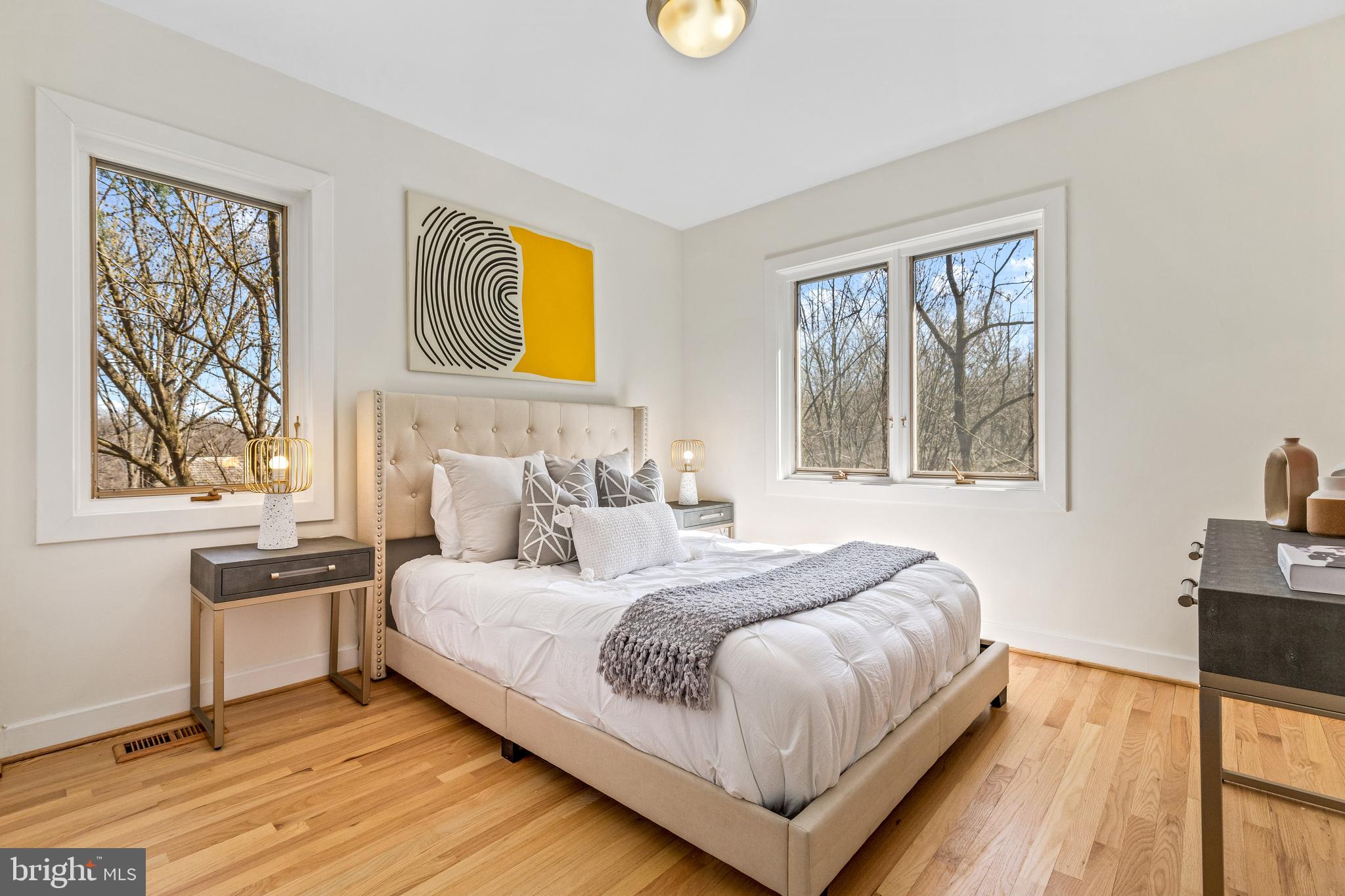 2609 Klingle Road Northwest Washington, DC 20008 - Photo 31 of 41 a bedroom with a bed and a window