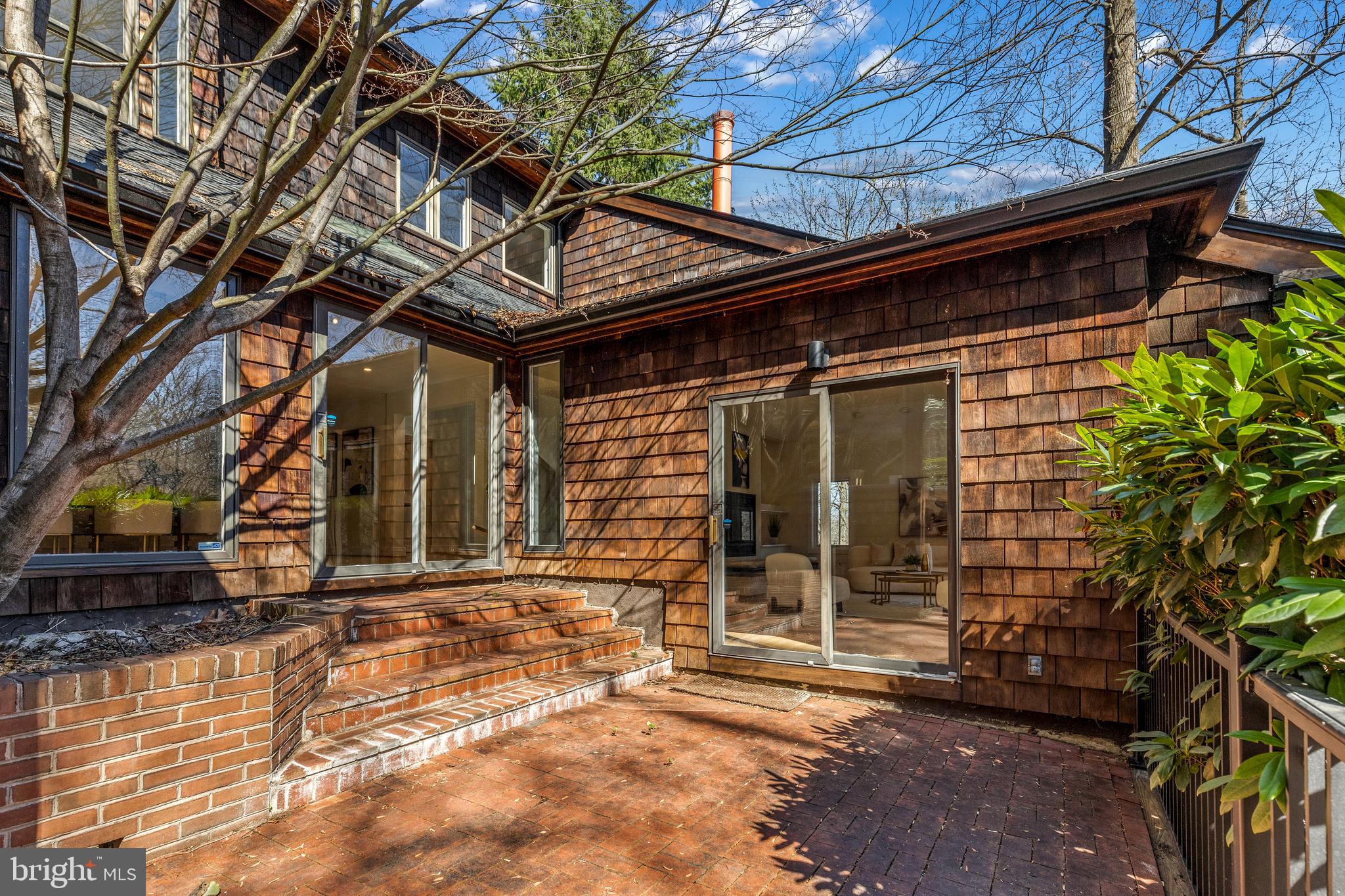 2609 Klingle Road Northwest Washington, DC 20008 - Photo 36 of 41 a yellow house with outdoor space