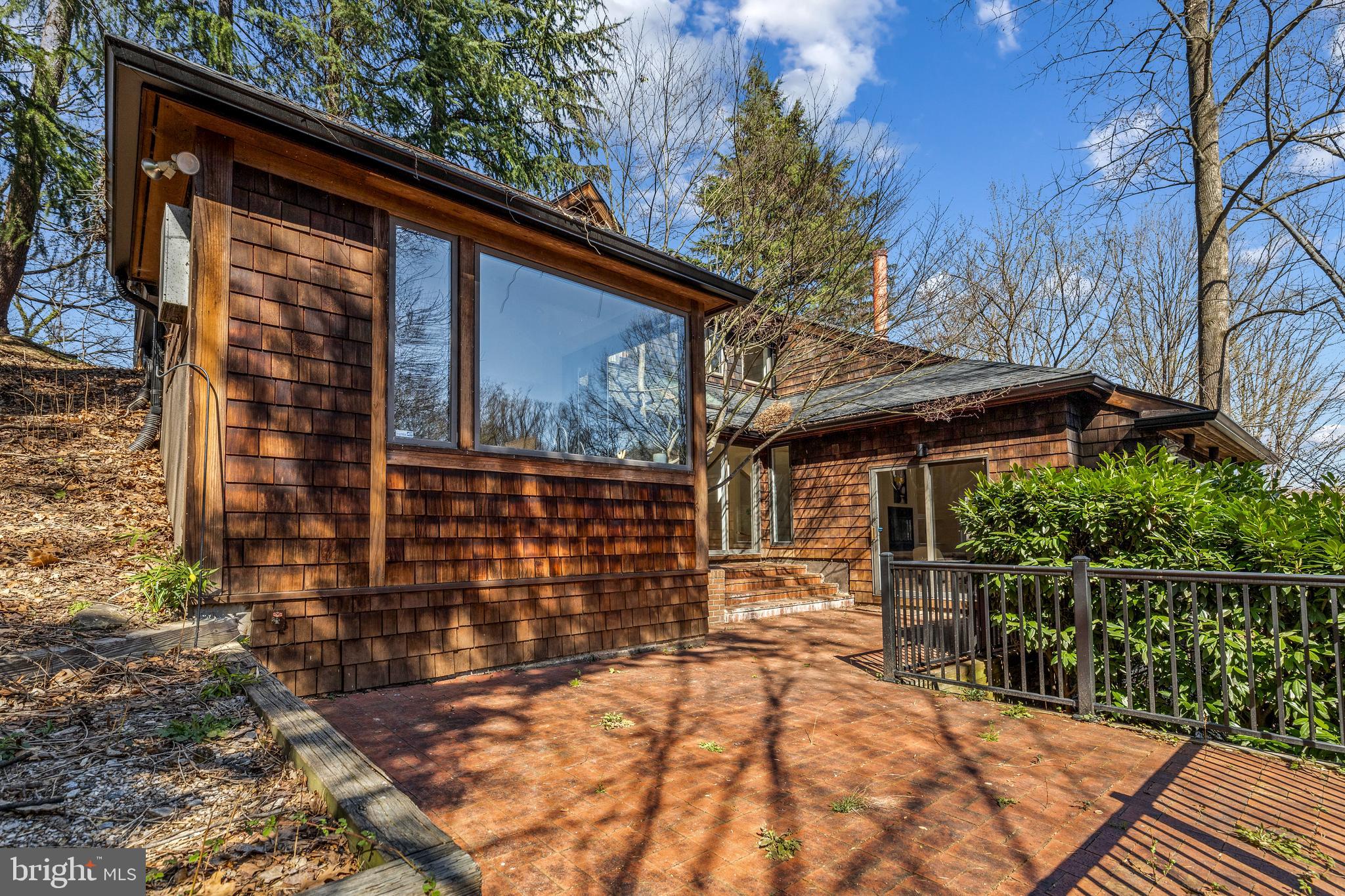 2609 Klingle Road Northwest Washington, DC 20008 - Photo 38 of 41 a view of house with backyard and trees