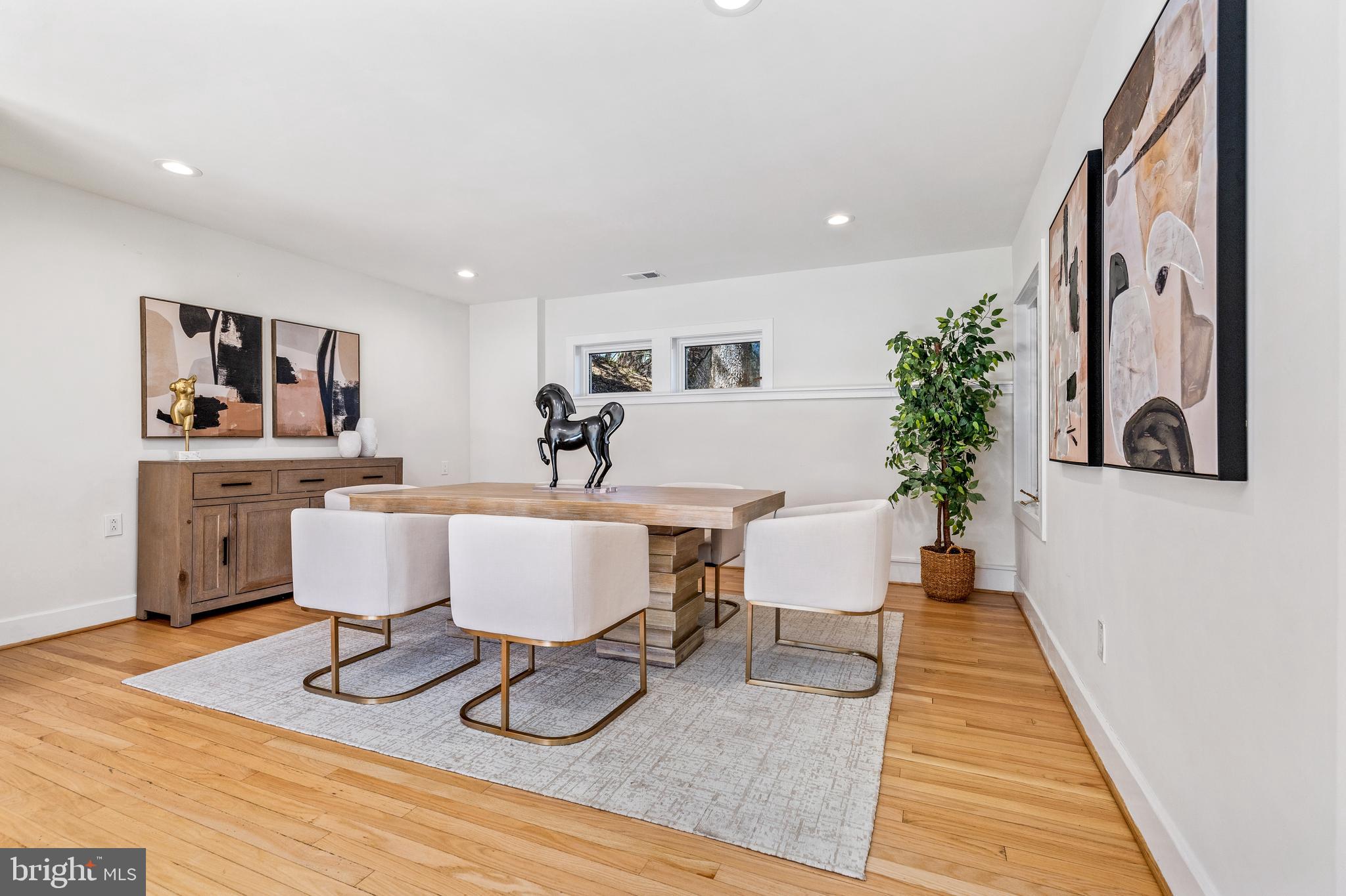 2609 Klingle Road Northwest Washington, DC 20008 - Photo 7 of 41 a living room with furniture and a wooden floor