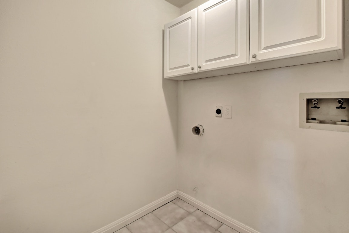 1704 East M. Franklin Avenue, Unit B Austin, TX 78721 - Photo 21 of 26 a view of kitchen with white cabinets