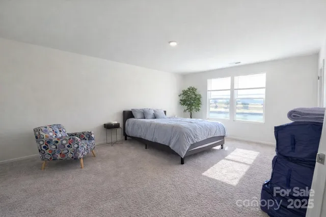 a room that has a window in it and a wooden floor