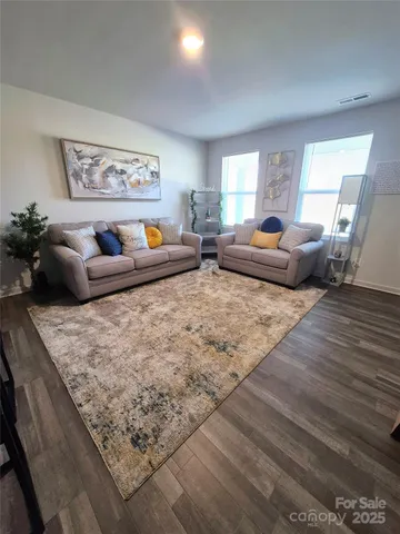 a living room with furniture and a couch