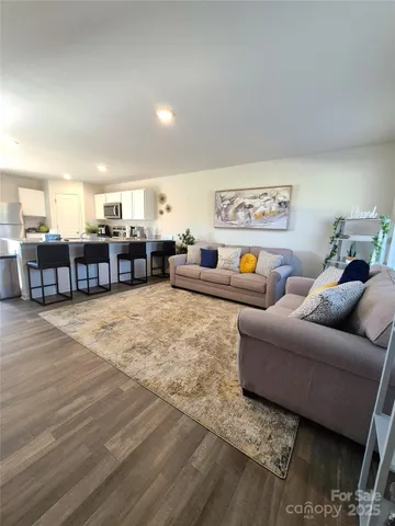 a living room with furniture and a couch