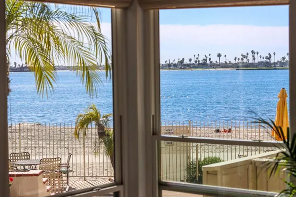 a view of a balcony with an ocean view
