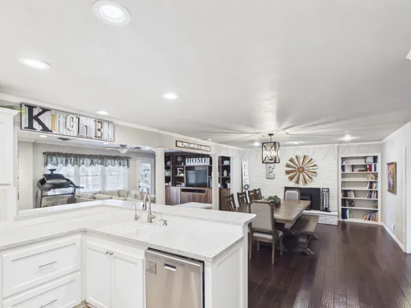 a kitchen with counter top space and cabinets